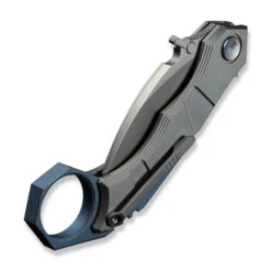 WE Tayra Folding Knife Karambit Gray Titanium/Blue Titanium Integral Backspacer & Finger Ring Handle M390 Plain Edge Stonewash Finish WE24069-2 -We Knife Clipping Path Tayra WE24069 2 6 70071.1752496042