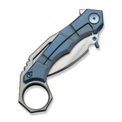 WE Tayra Folding Knife Karambit Blue Titanium/GrayTitanium Integral Backspacer & Finger Ring Handle M390 Plain Edge Hand Rubbed Satin Finish WE24069-3 -We Knife Clipping Path Tayra WE24069 3 5 78138.1752496112