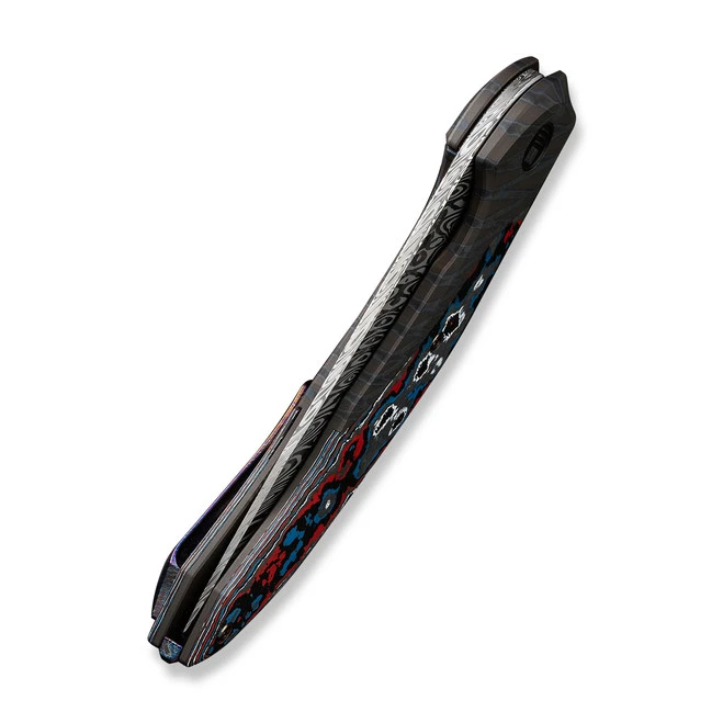 WE Merata Folding Knife Tiger Stripe Pattern Flamed Color Titanium/Nebula Fat Carbon Fiber Handle Damasteel Trailing Point Plain Edge Limited Edition WE22008B-DS1 8 WE Merata Folding Knife Tiger Stripe Pattern Flamed Color Titanium/Nebula Fat Carbon Fiber Handle Damasteel Trailing Point Plain Edge Limited Edition WE22008B-DS1 - Image 6